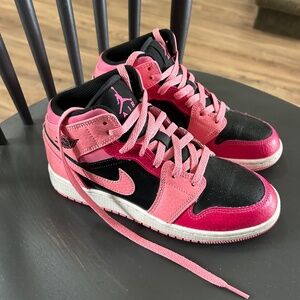 4.5 Youth or 6.5 Women’s mid top Jordans-Nike